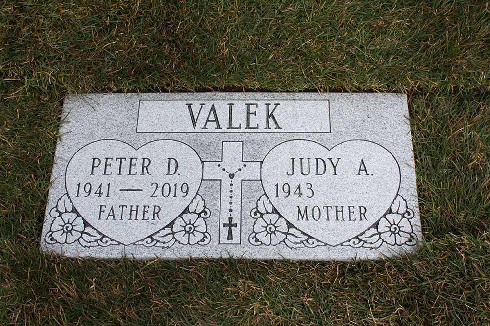 Light grey granite marker with hearts and 2 names