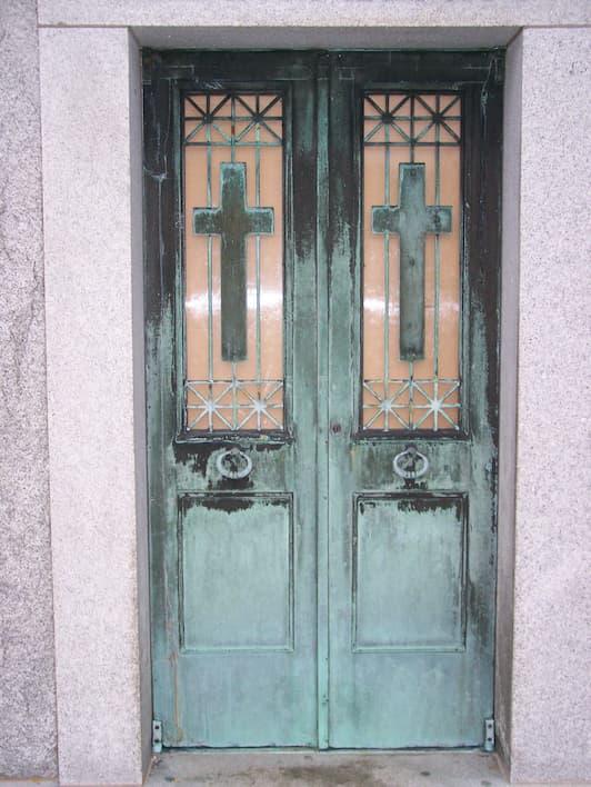 Doors with two crosses before repair