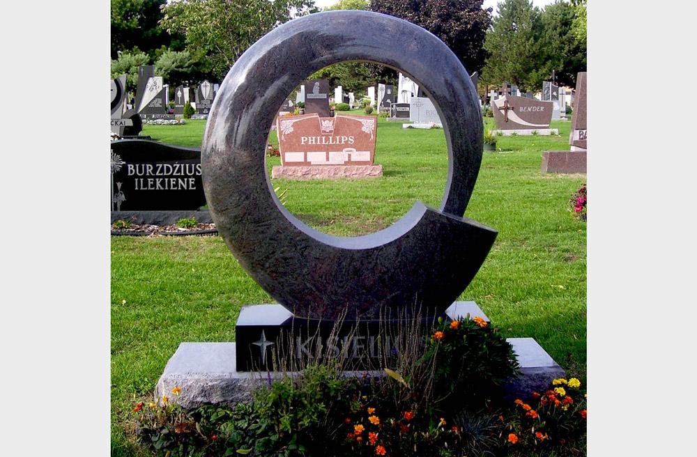 Contemporary family monument with circular shape