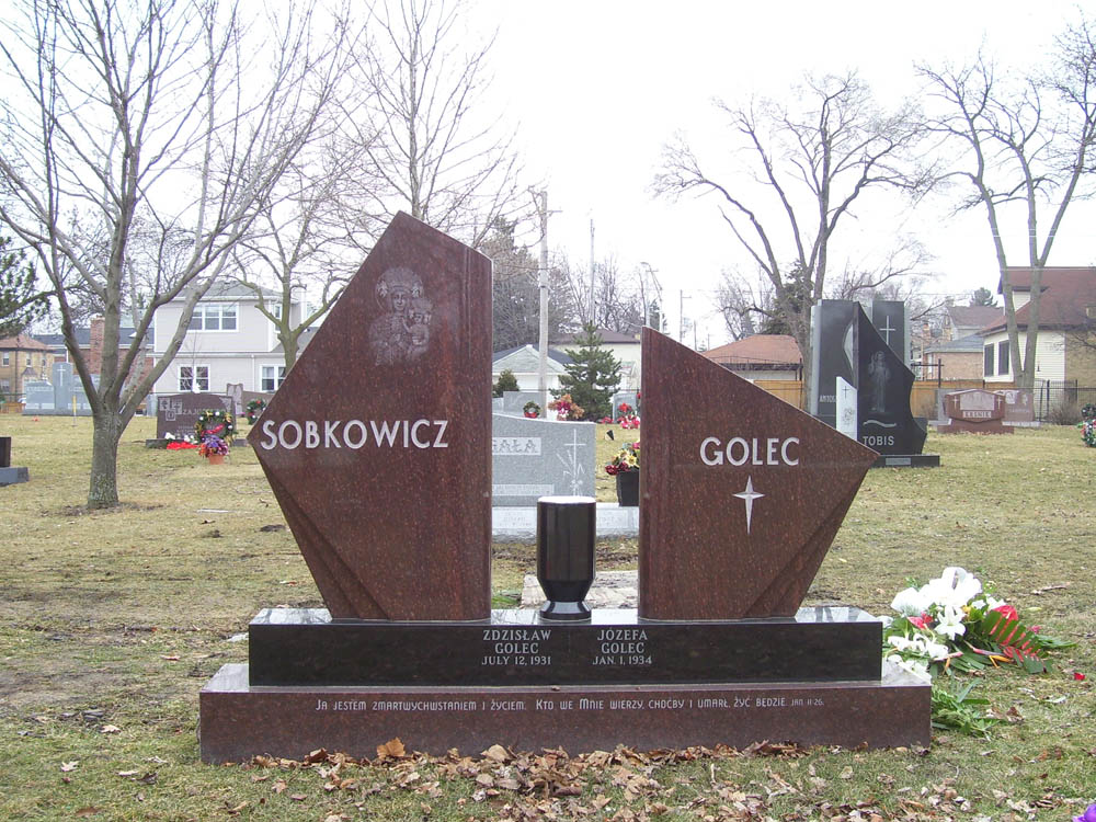 Family monument with hand etching of a Christian figure and a Polish verse