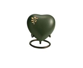 Small dark green heart shaped urn with flower
