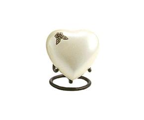 Small pearl heart shaped urn with yellow flower
