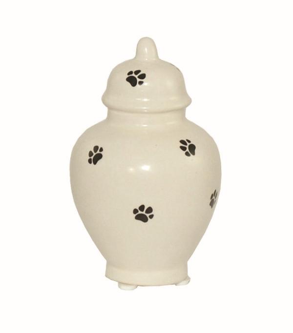 small ceramic urn with paws and round lid